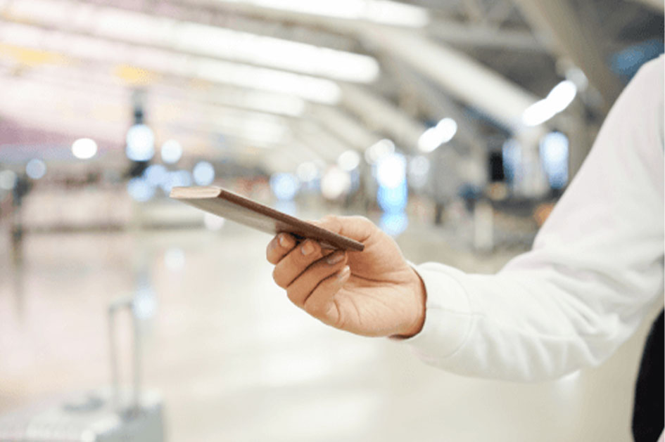 close-up-traveller-man-hand-holding-passport